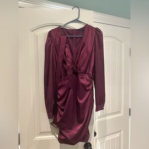 Satin long sleeve mini dress with belt.